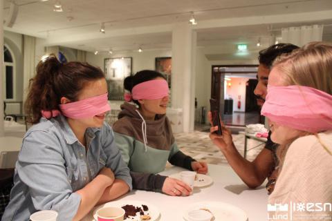 Students participating in 'Fika in the Dark'